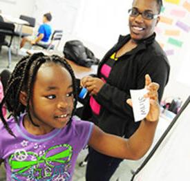 Student and teacher at Healthy Hero summer camp